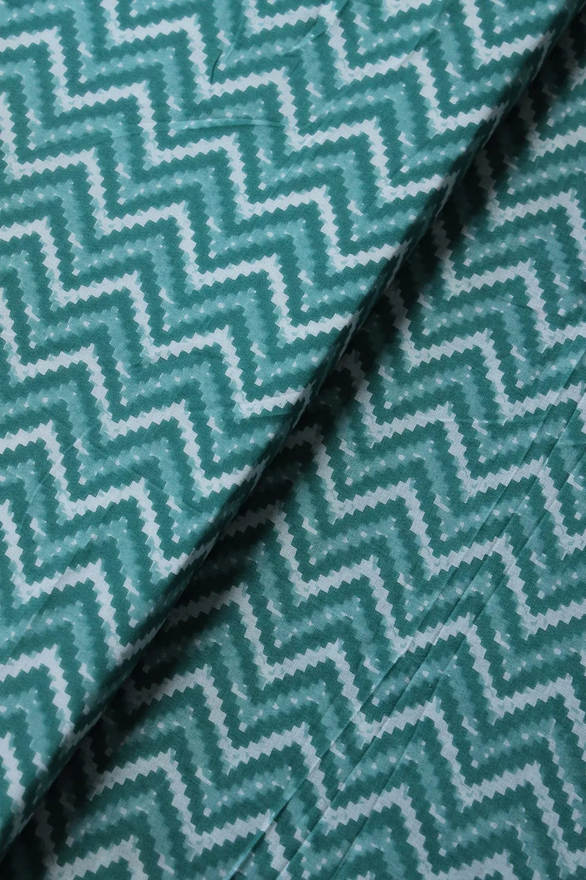 White And Jungle Green Chevron Print On Pure Cotton Fabric
