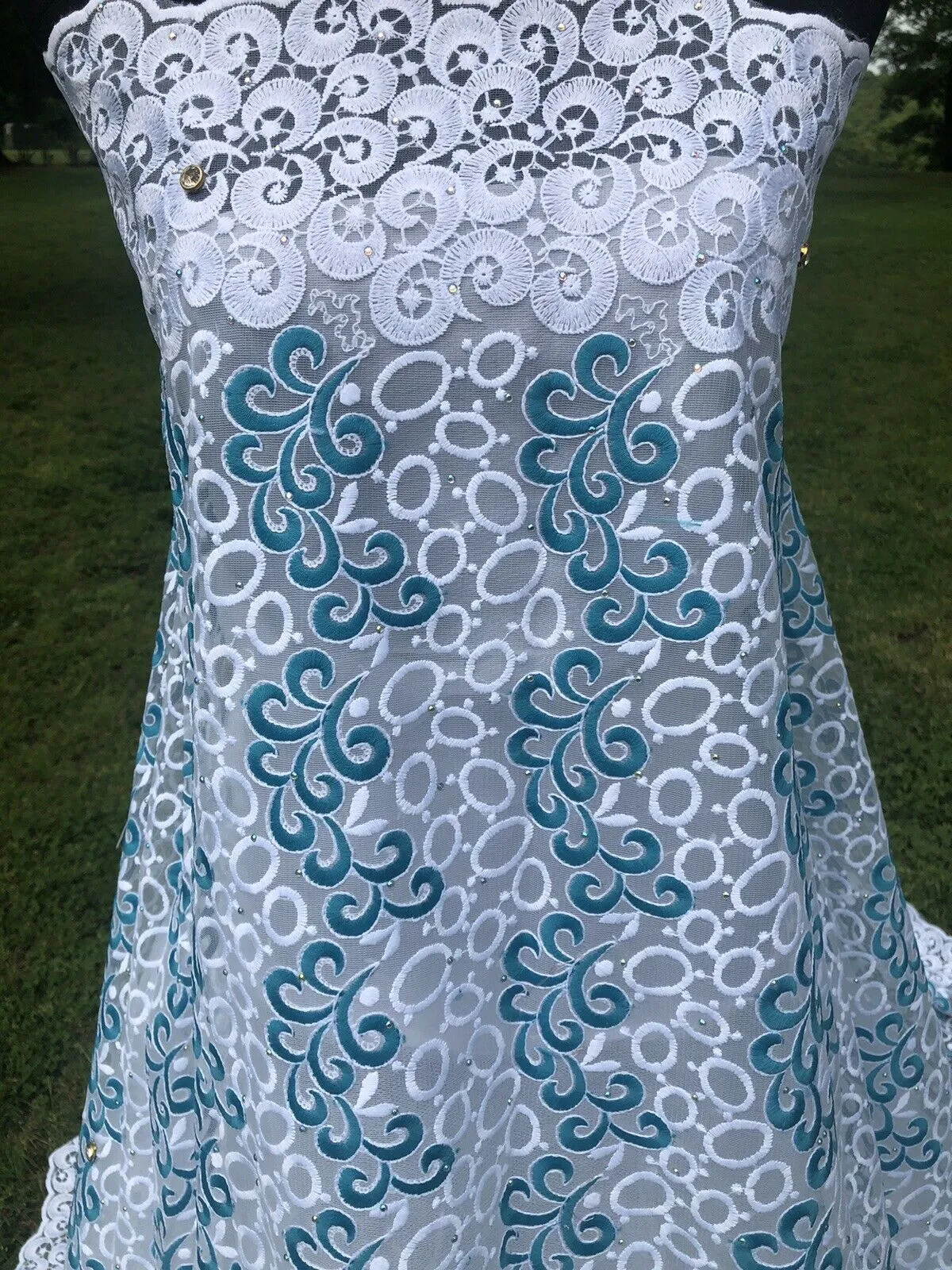 White And Teal Embroidered Lace Fabric